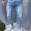 Blugi pentru barbati cu efect rupt si prespalat-albastru deschis cod 78459